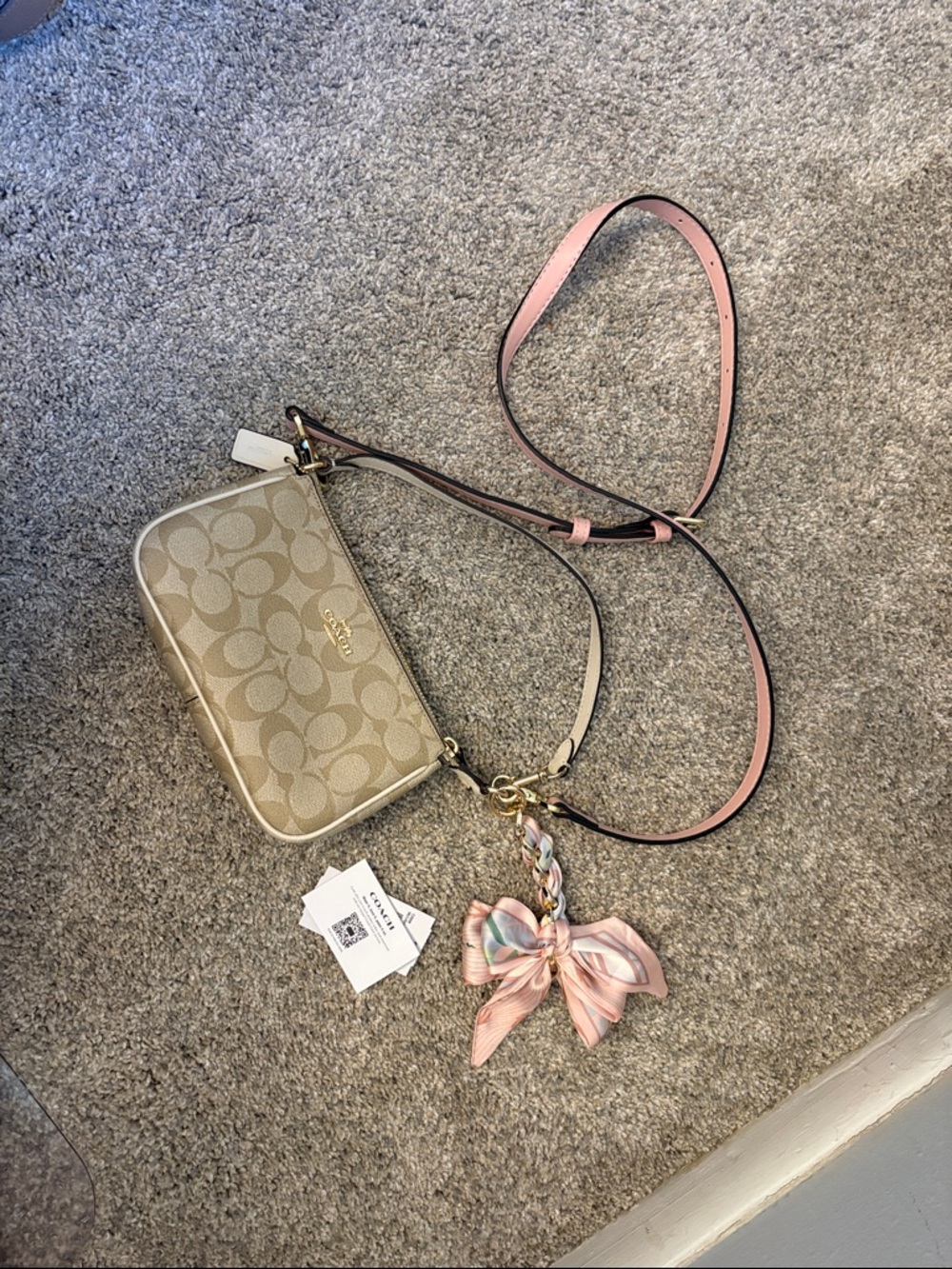 Coach Beige Signature Canvas Crossbody with Pink Strap and Bow